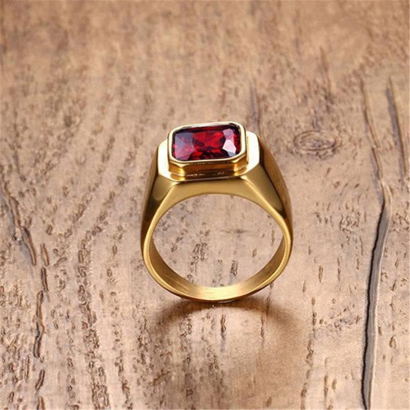 Tavros Golden Ring with Red Stone