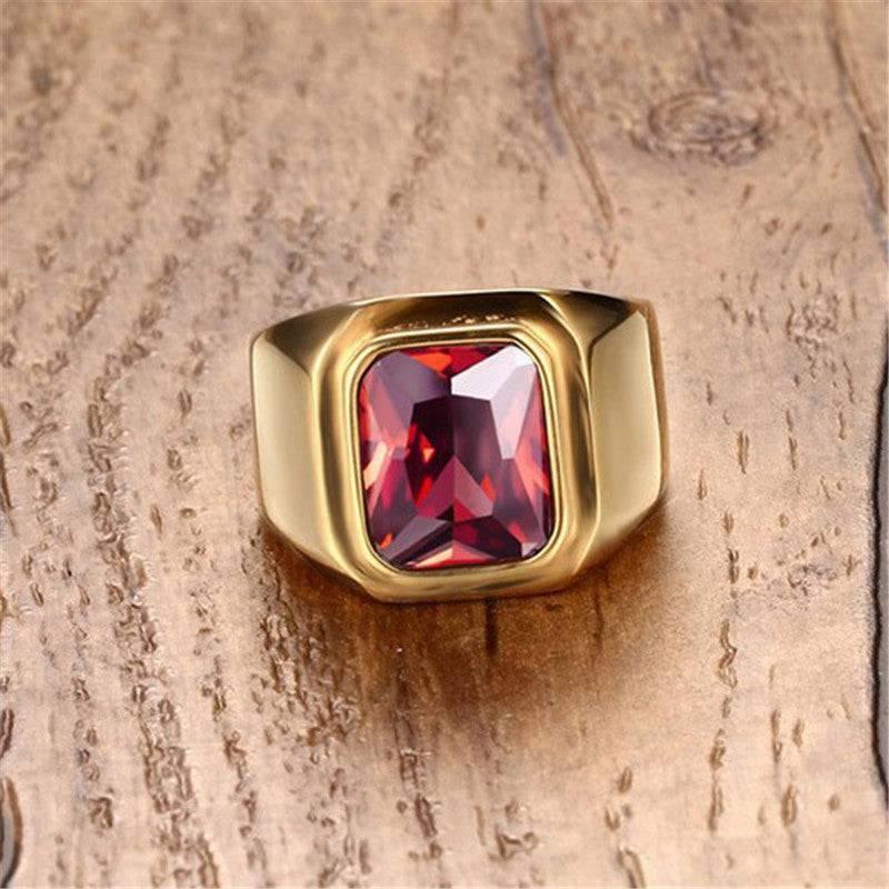 Tavros Golden Ring with Red Stone